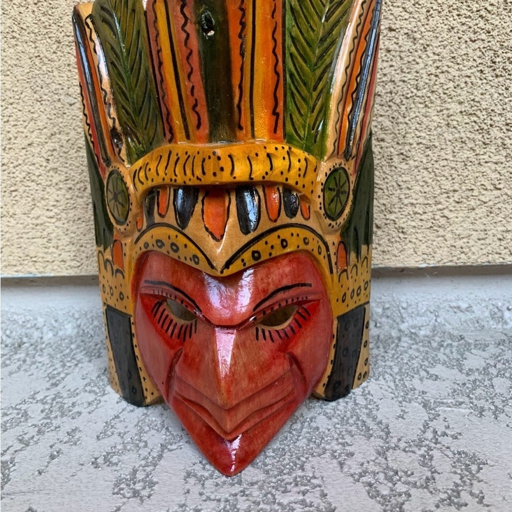Handcrafted Tribal Mask with Red and Orange Accents